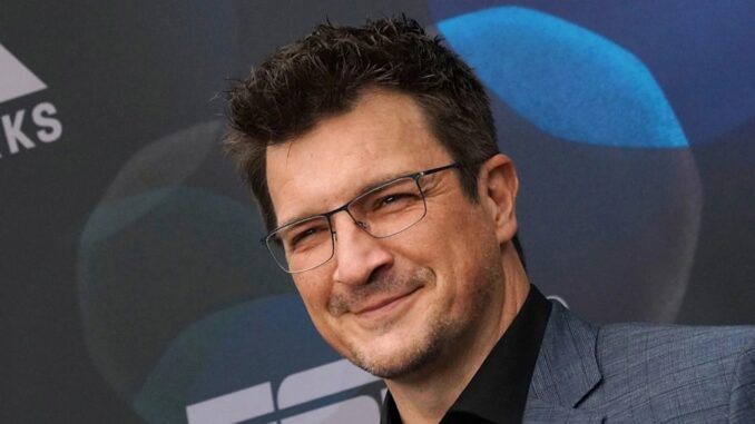 e155ad39e67f-nathan-fillion-grey-suit.jpg_11zon