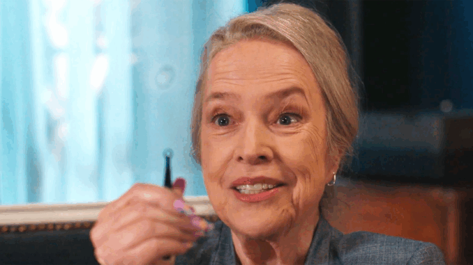 kathy-bates-holding-up-a-finger