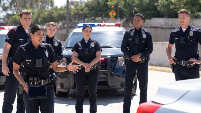 john-nolan-celina-juarez-seth-ridley-lucy-chen-miles-penn-and-tim-bradford-in-uniform-on-a-street-next-to-cars-from-the-rookie_11zon