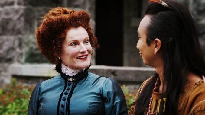 rebecca-wisocky-as-hetty-in-ghosts-season-3-smiling-and-talking-to-sas_11zon