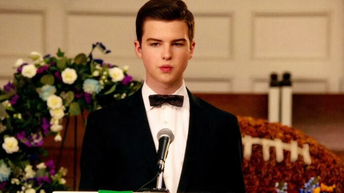 sheldon-iain-armitage-lost-in-thought-attempts-to-give-a-speech-for-his-father-at-his-funeral-in-young-sheldon-season-7-episode-13