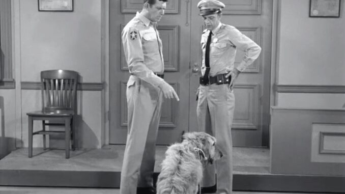 Barney-Brings-in-Blue-the-Dog-to-Help-Run-the-Sheriffs-Office-2025-07-21T044558.943Z.jpg Barney Brings in Blue the Dog to Help Run the Sheriff’s Office