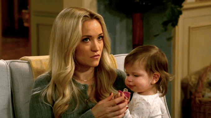 emily-osment-s-mandy-holds-her-b