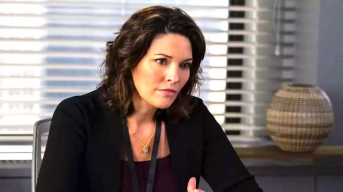 alana-de-la-garza-s-isobel-sits-at-a-desk-frowning-in-fbi-season-7