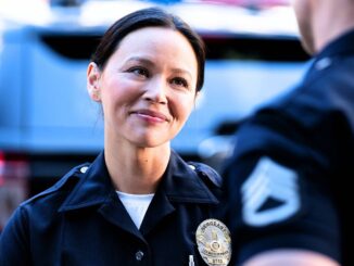 Lucy chen in uniform smiling out