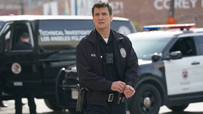 Nathan fillion in a police unifo